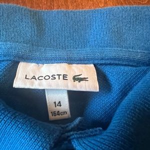 Lacoste, blue polo shirt, boys size 14, in great condition!